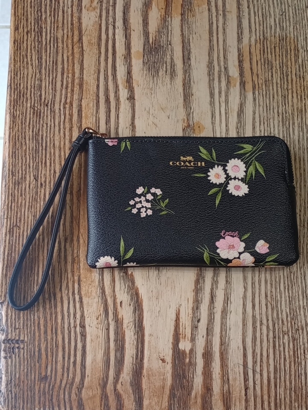 Coach Black Floral Zip Wristlet with Gold Logo
